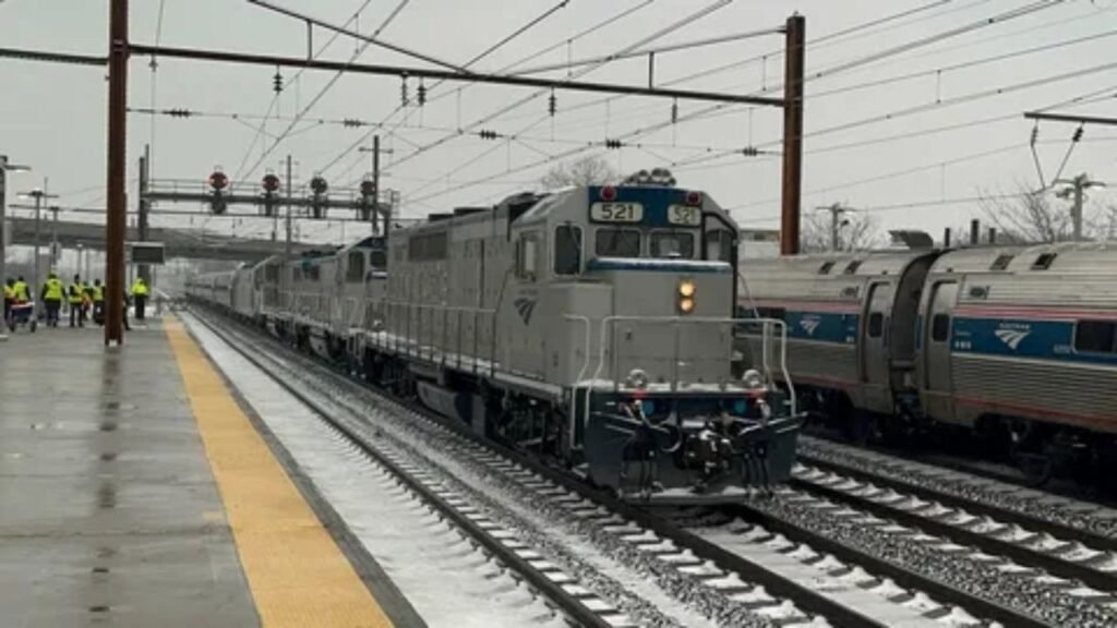 Amtrak high speed Acela train traveling on the Northeast Corridor route between Washington DC and New York City.