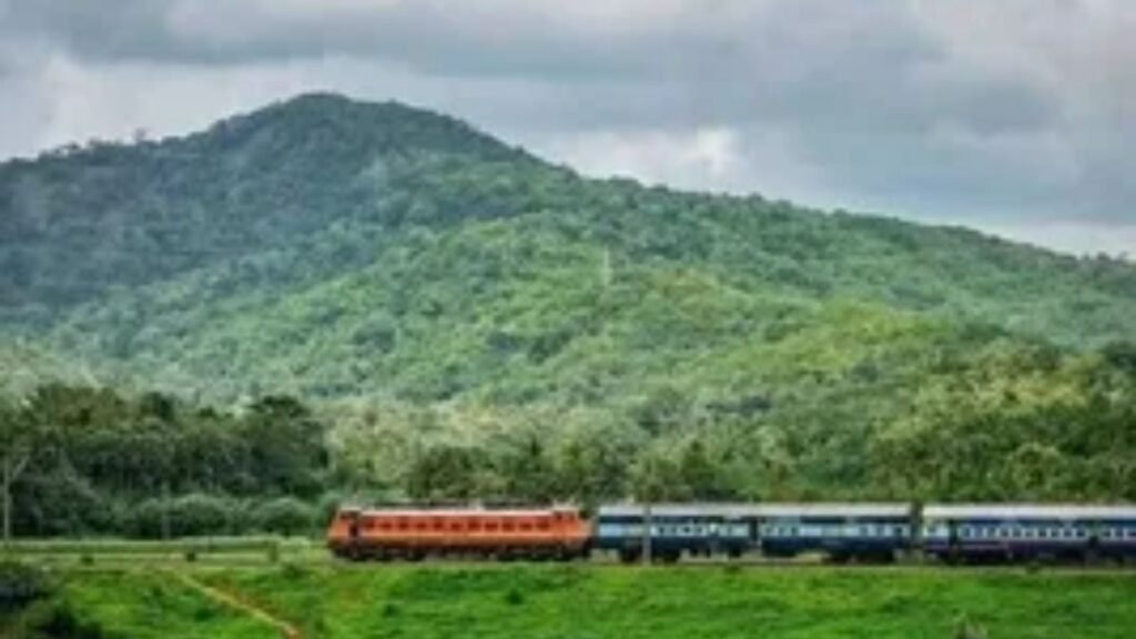 Travelling in train passing through beautiful scenic mountains and green landscapes.