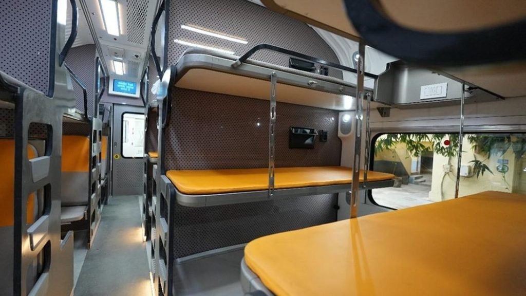 Comfortable private sleeper train cabin with beds and fresh bedding