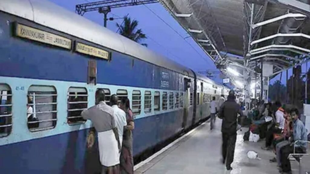 Passengers boarding a train at a modern railway station platform