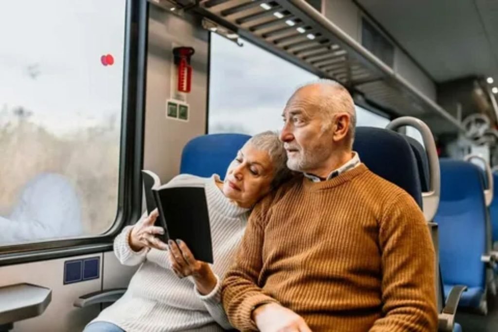Comfortable seating area inside a spacious train carriage suitable for senior travelers