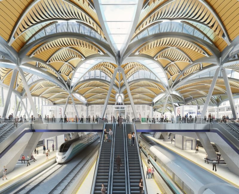 Busy modern train station terminal with passenger displays