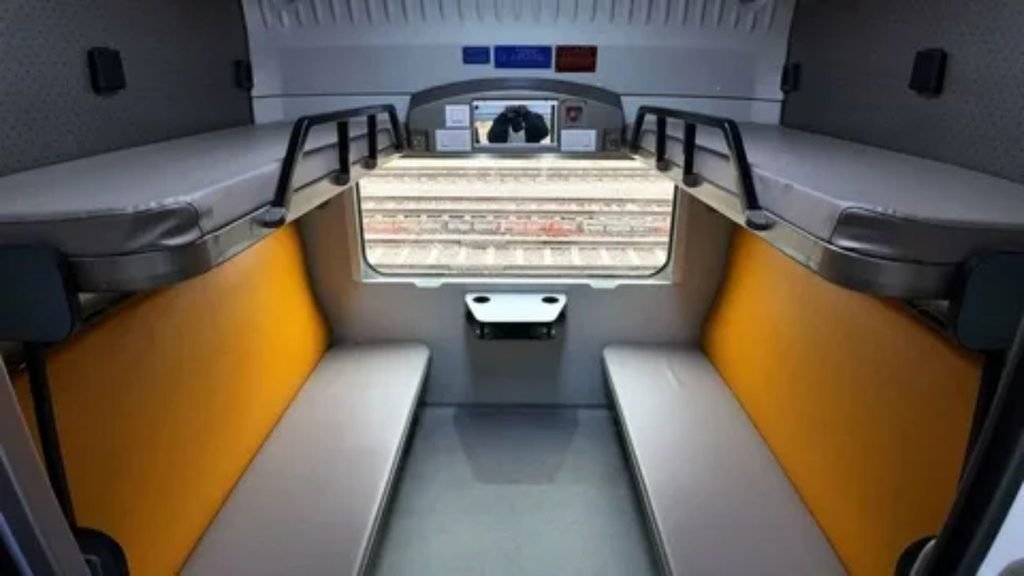 Passengers enjoying a comfortable journey on a modern UK train to Birmingham