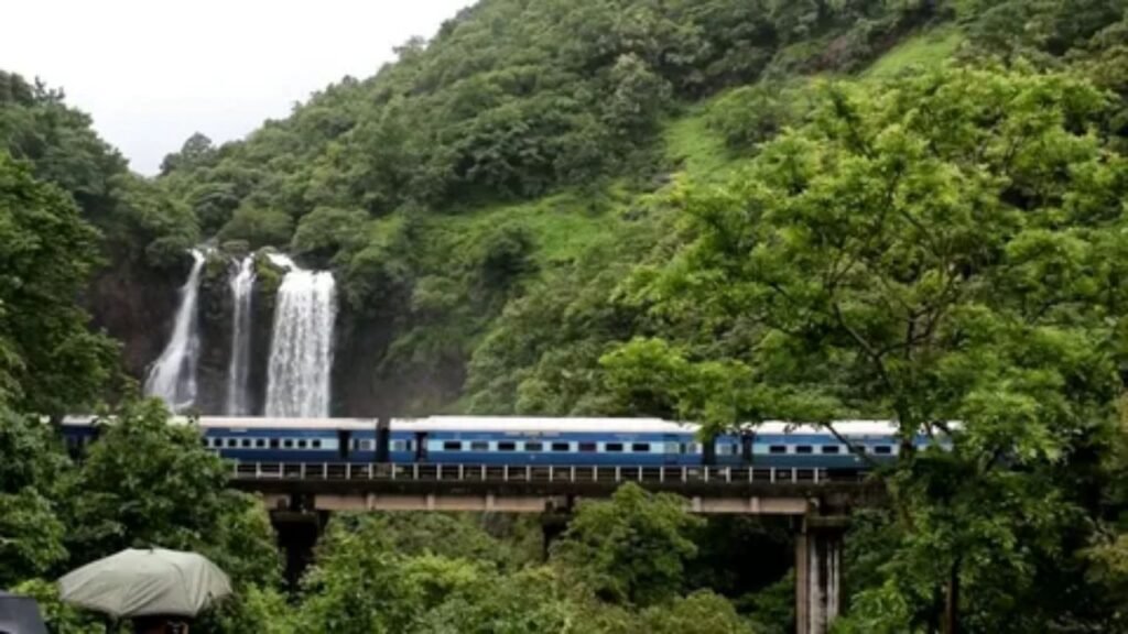 Amtrak Superliner train traveling through a scenic mountain landscape