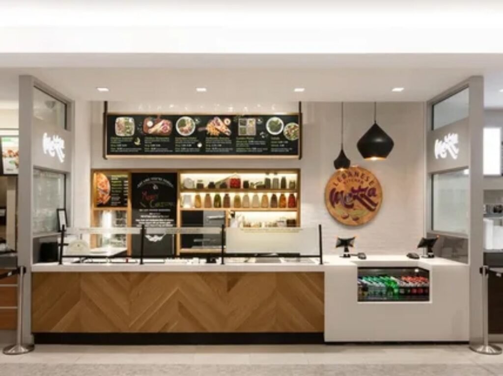 Amtrak train cafe counter offering food and drinks for passengers