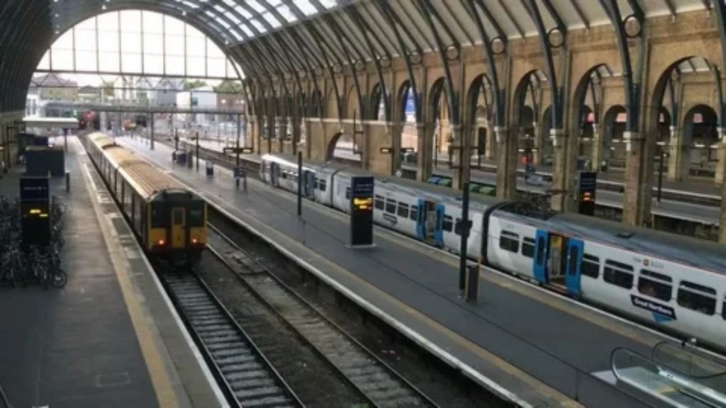 Exterior and platform view of London Kings Cross railway station for trains heading to Scotland