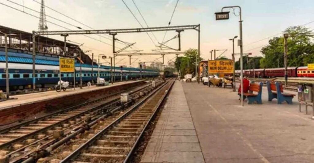 Traveler stepping off a sleeper train onto the platform at sunrise
