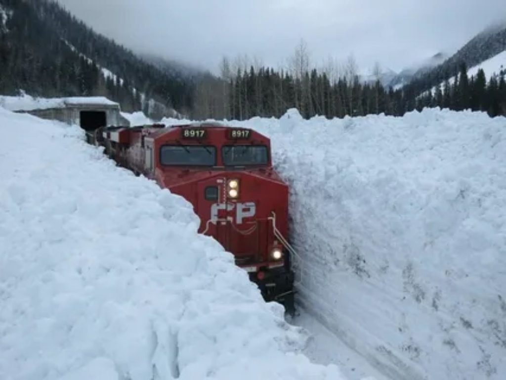 Dramatic snow capped mountain scenery along the Toronto to Vancouver train route