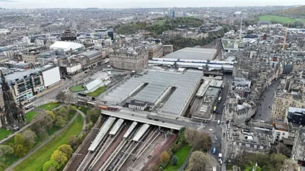 Edinburgh Waverley railway station platform with trains ready for departure