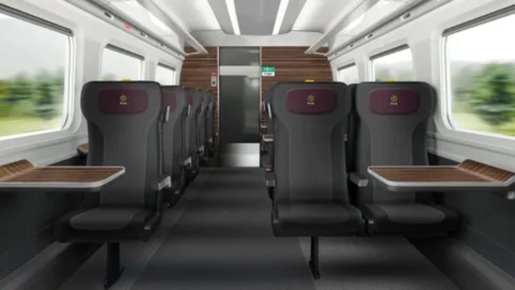 Comfortable standard class seating inside LNER train from Edinburgh to London
