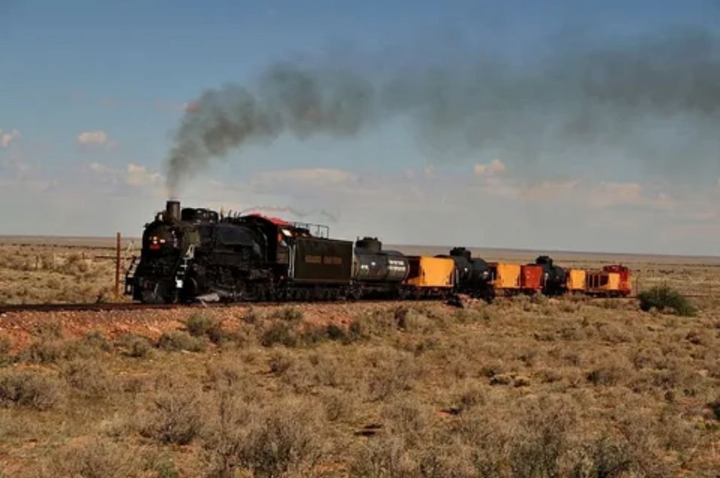 Grand Canyon Railway historic steam locomotive train arriving at the Grand Canyon depot