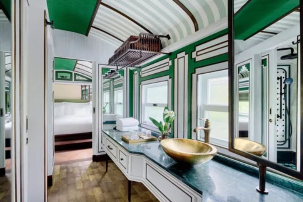 Confident solo traveler sitting inside a modern train enjoying a safe journey