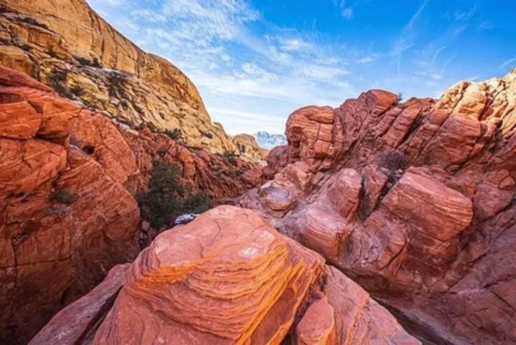 Dramatic mountain and canyon scenery viewed from a train window in America