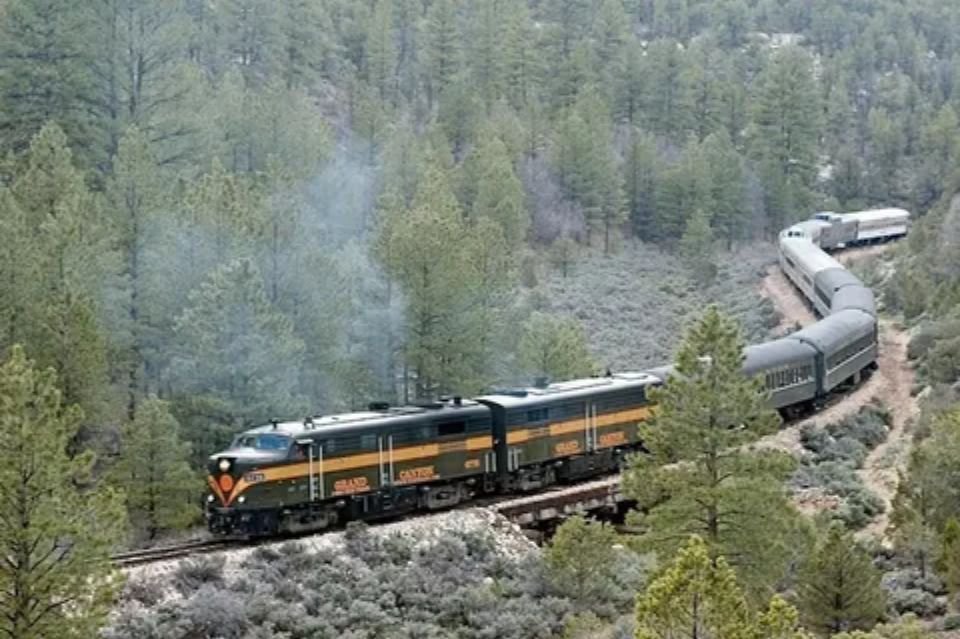 Scenic passenger train route through Colorado Rocky Mountains scenery