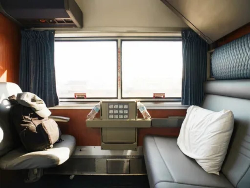 Comfortable passenger seating inside a scenic train observation car